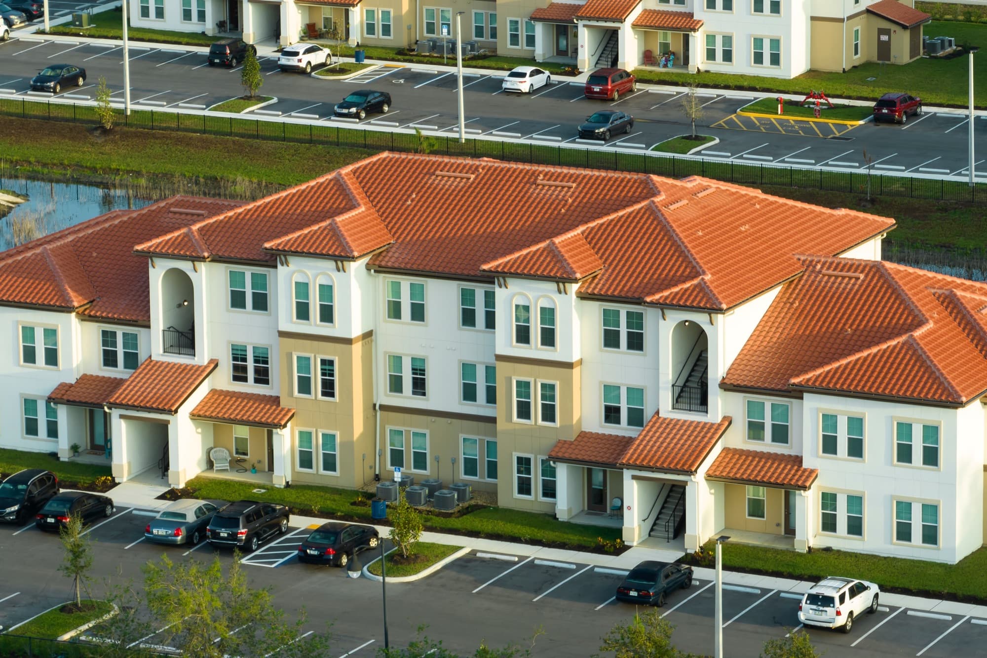 Tile-roof multifamily, full-property scope.